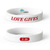 Love Gives Bumper Sticker and Wristband